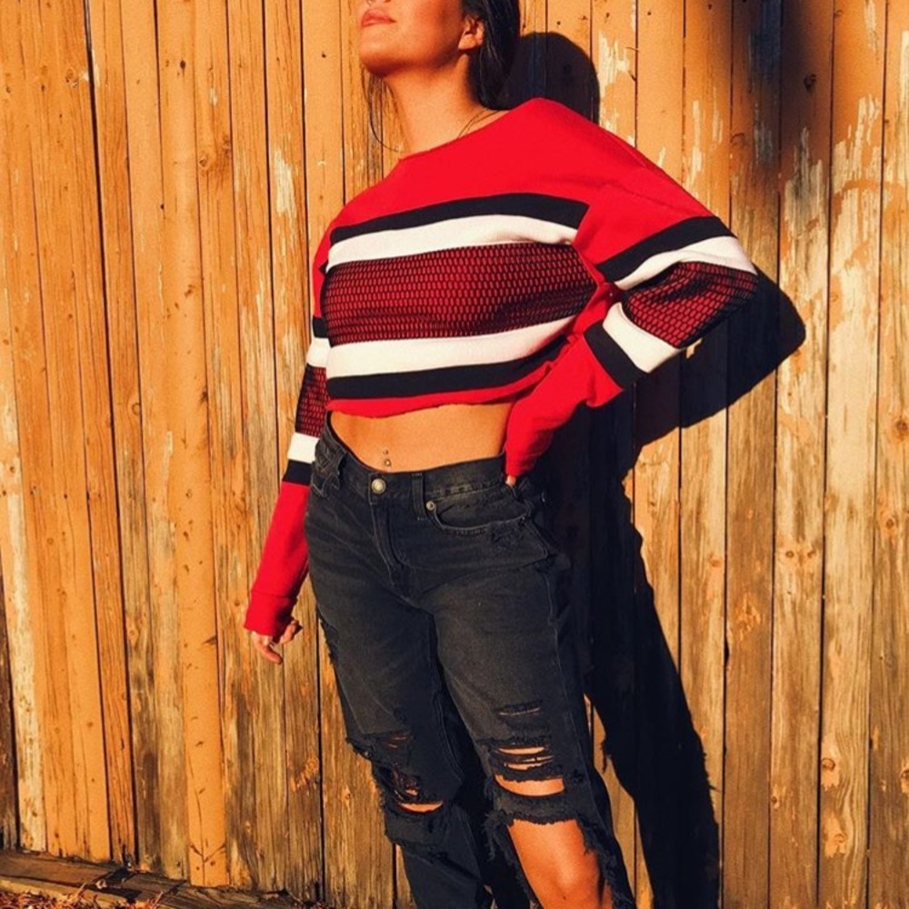 Red and black striped workout sweater